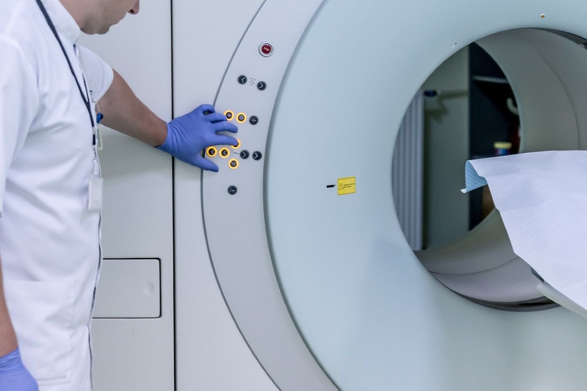 Doctor using MRI machine